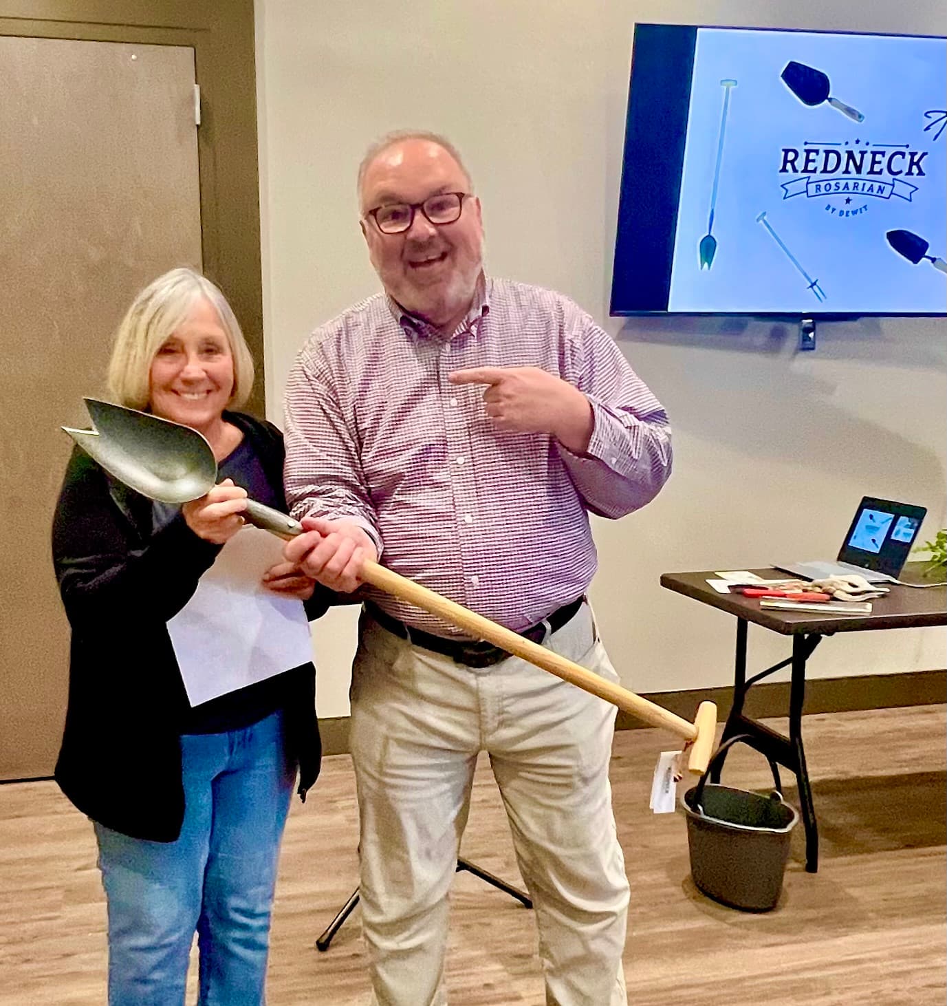 Chris VanCleave being presented an award at a garden club meeting